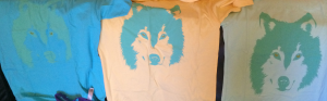 Bright colored wolf face shirts.